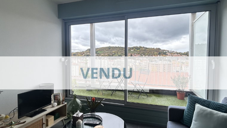Appartement de 38 m² avec terrasse et place de parking.