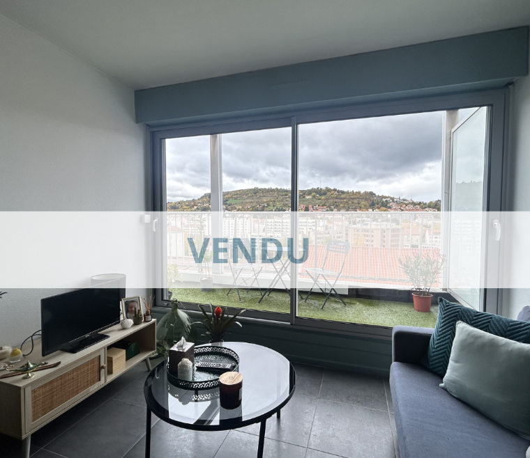 Appartement de 38 m² avec terrasse et place de parking.