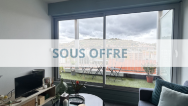 Appartement de 38 m² avec terrasse et place de parking.