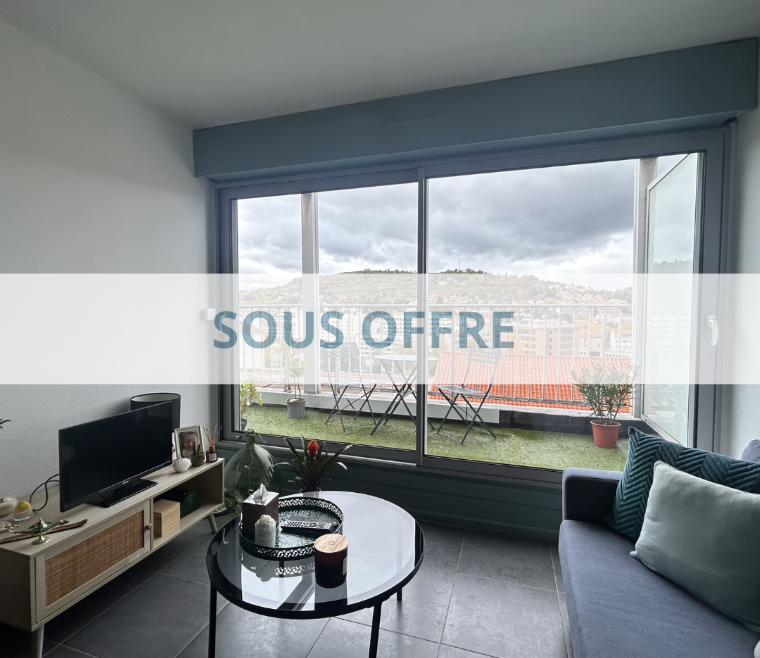 Appartement de 38 m² avec terrasse et place de parking.